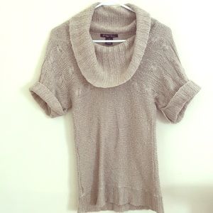 Women’s cowl neck sweater.